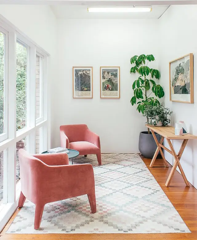 Contact Us 1 Two pink armchairs on the contact us page on Essential Mind Healthcare website